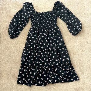 Size small. Black dress with white/pink flowers. Worn once.